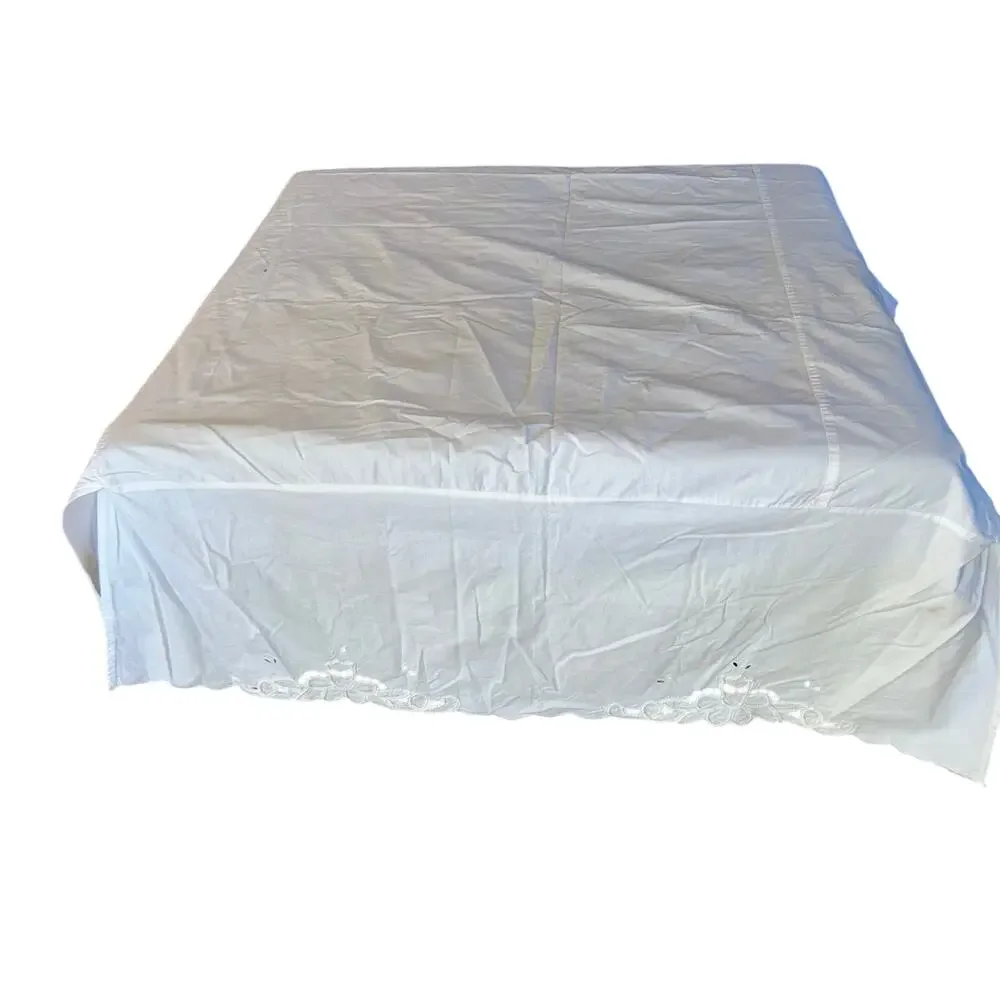 Vintage JCPenney white embroidered cut out table cloth